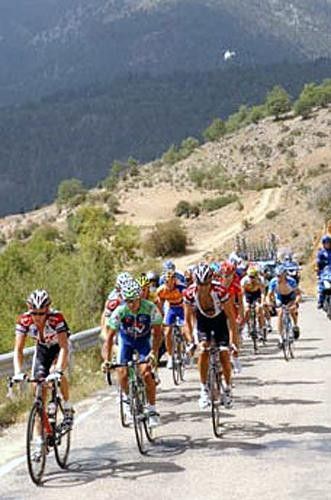 The peloton begin their ascent of the Category 2 climb of Cubillo.