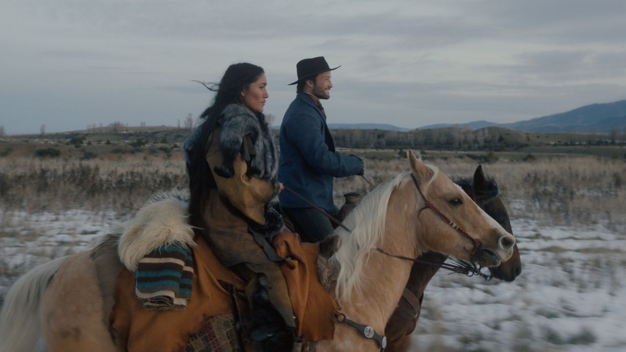Q&rsquo;orianka Kilcher and Brandon Lessard riding horses in The Unholy Trinity