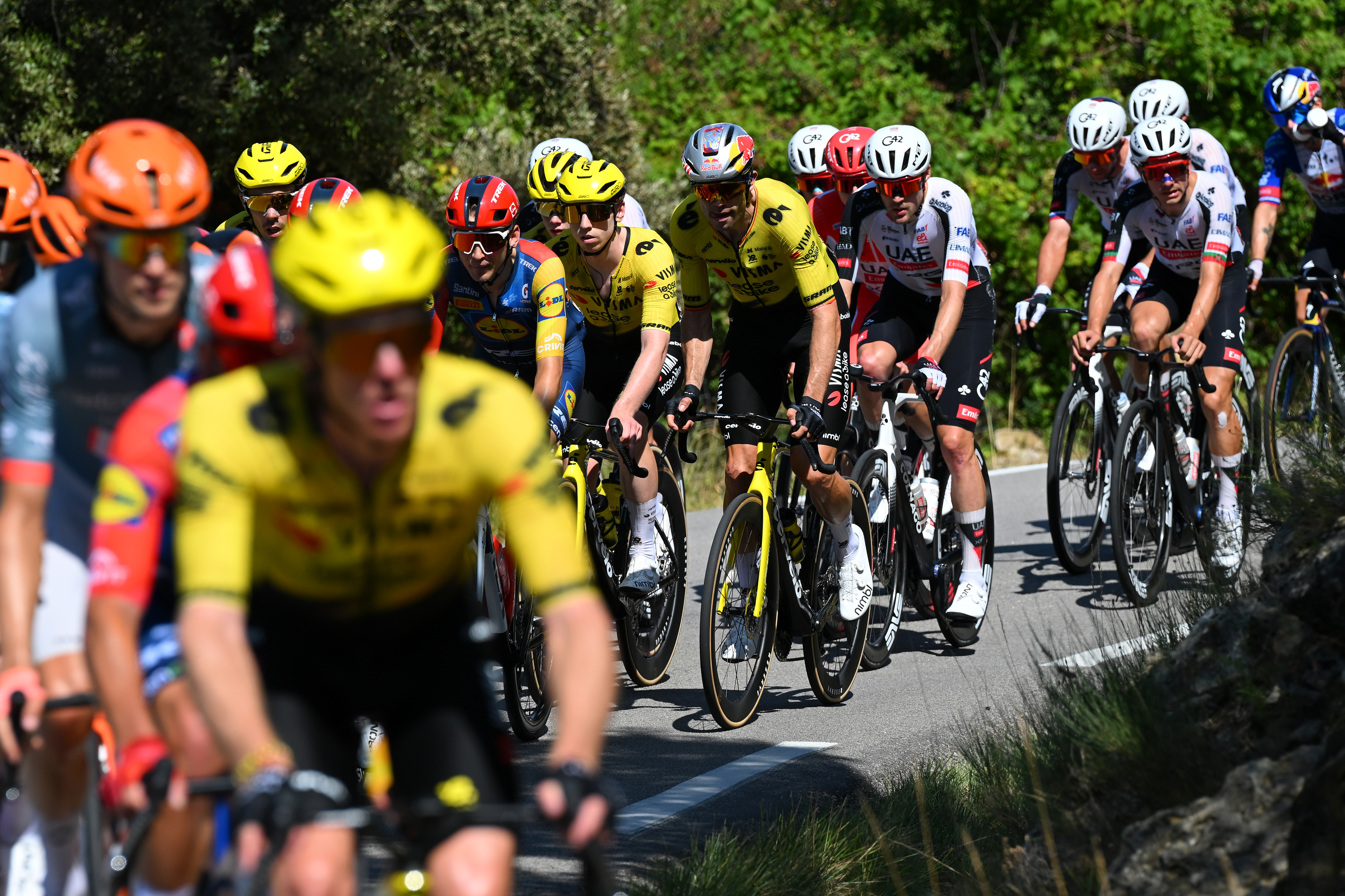 MANOSQUE, MONACO - AUGUST 23: (L-R) Matthew Brennan of Great Britain and Wout Van Aert of Belgium and Team Visma | Lease a Bike compete during the La Vuelta - 81st Tour of Spain 2026, Stage 2 a 214.3km from Monaco to Manosque 408m / #UCIWT / on August 23, 2026 in Manosque, Monaco. (Photo by Tim de Waele/Getty Images)