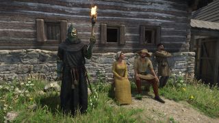 KCD2 torch - Henry carrying a torch by some villagers