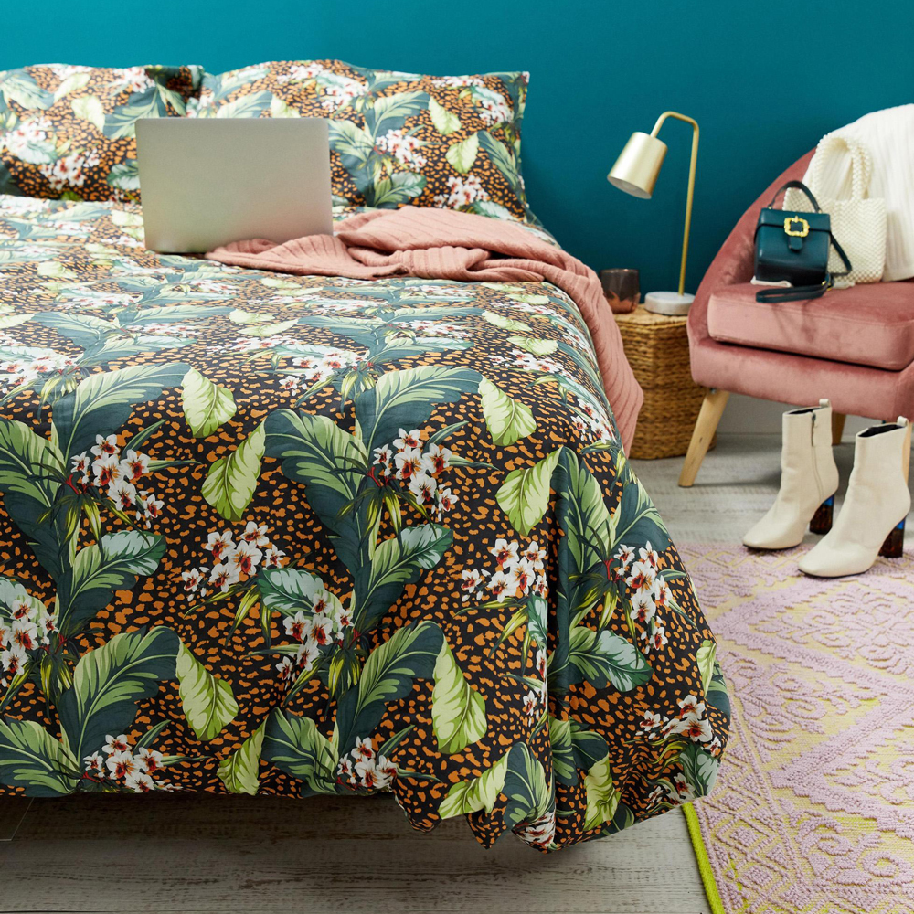 bedroom with bed table lamp and chair