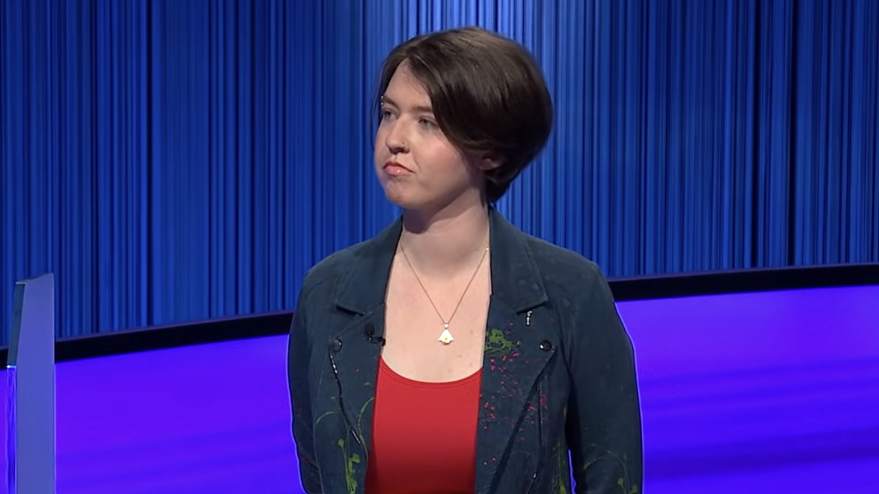Stella Trout in jacket and red shirt during Final Jeopardy in Wildcard Championship Finals