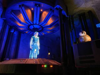 Rey appears via hologram to welcome guests to the Resistance and give them instructions for a secret mission.