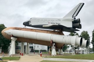 The space shuttle "Pathfinder" as it appeared at the U.S. Space & Rocket Center prior to the work to disassemble and lower the mock orbiter to begin a multi-year restoration effort.