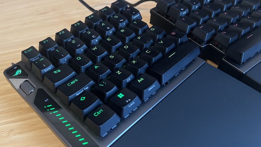 Close up on keys and volume controls of Asus ROG Falcata gaming keyboard