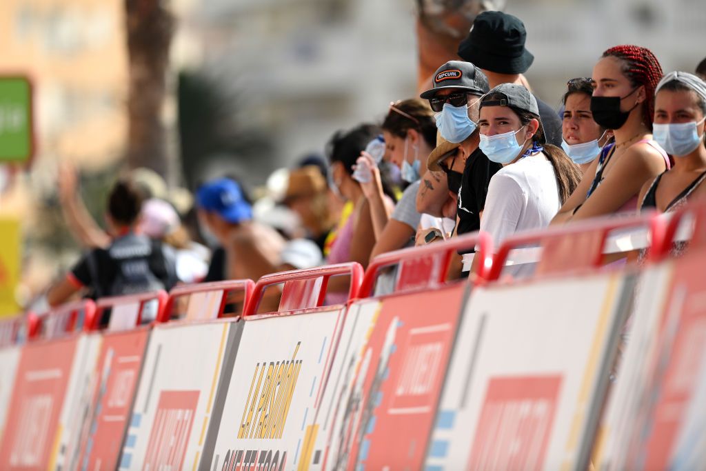 LA MANGA SPAIN AUGUST 21 Fans on the end enjoying the arrival during the 76th Tour of Spain 2021 Stage 8 a 1737 km stage from Santa Pola to La Manga del Mar Menor lavuelta LaVuelta21 on August 21 2021 in La Manga Spain Photo by Stuart FranklinGetty Images