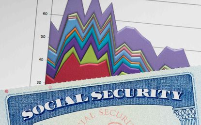 A Social Security card in front of a chart.