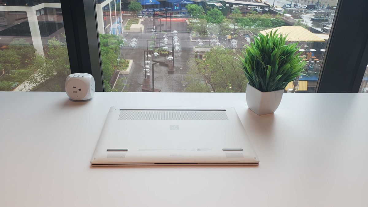 white laptop on table