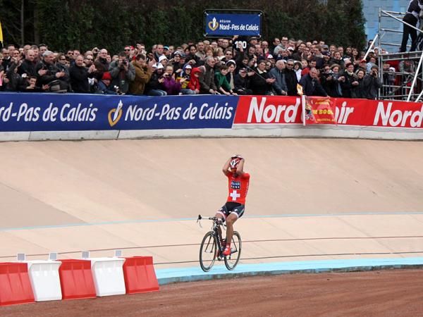 Fabian Cancellara (Saxo Bank) takes in the enormity of the moment before crossing the line.