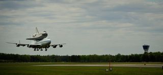 Shuttle Carrier Aircraft Carrying Discovery About to Land