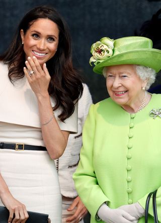 Meghan Markle with the late Queen Elizabeth
