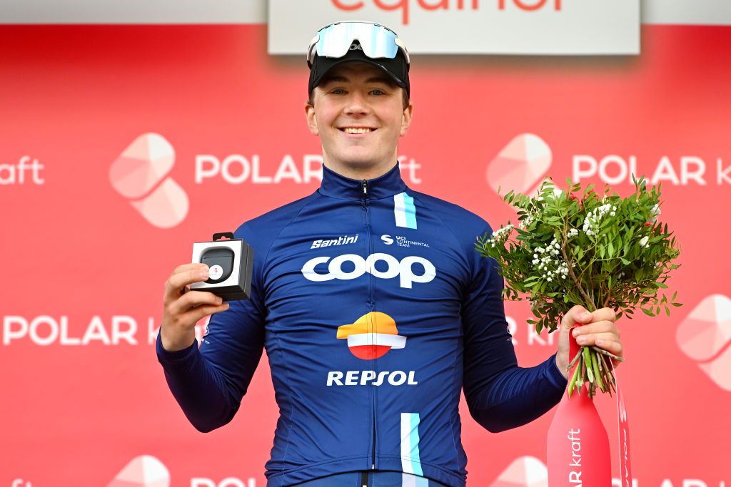 ALTA NORWAY AUGUST 17 Johan Ravn&oslash;y of Norway and Team CoopRepsol celebrates at podium as most combative rider trophy during the 10th Arctic Race of Norway Stage 1 a 171km stage from Kautokeino to Alta UCIWT on August 17 2023 in Alta Norway Photo by Luc ClaessenGetty Images