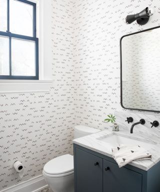 Black and white wallpaper, black taps and lights