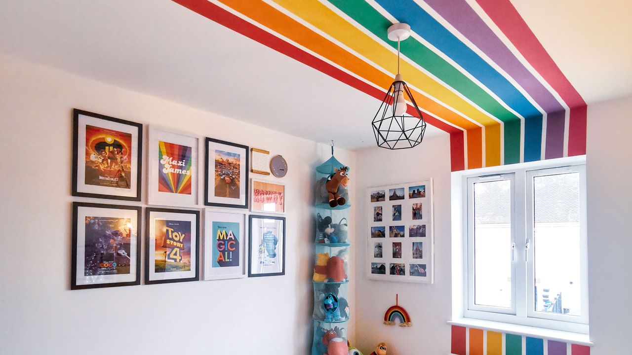 kids&#039; bedroom with rainbow mural