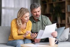 Couple looking over bills