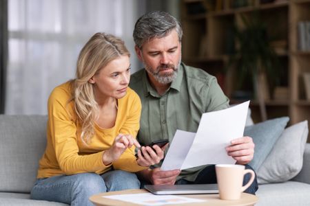 Couple looking over bills