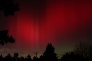 Skywatcher Samuel Hartman of State College, Pa., snapped this photo of the amazing Oct. 24, 2011 northern lights display. The aurora display was created from charged solar particles from an Oct. 22 sun storm that took two days to reach Earth.