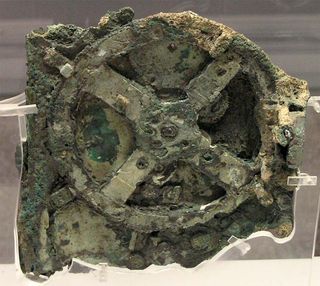 First discovered in the early 1900s by local sponge divers, the wreck is most famous for the Antikythera mechanism, which contains a maze of interlocking gears and mysterious characters etched all over its exposed faces. Originally thought to be a kind of navigational astrolabe, archaeologists continue to uncover its uses and now know that it was, at the very least, a highly intricate astronomical calendar.