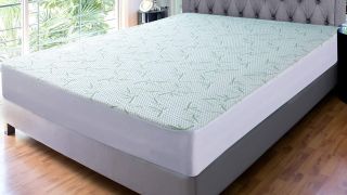 Best mattress protectors: the Utopia Bedding Premium Bamboo shown on top of a white mattress