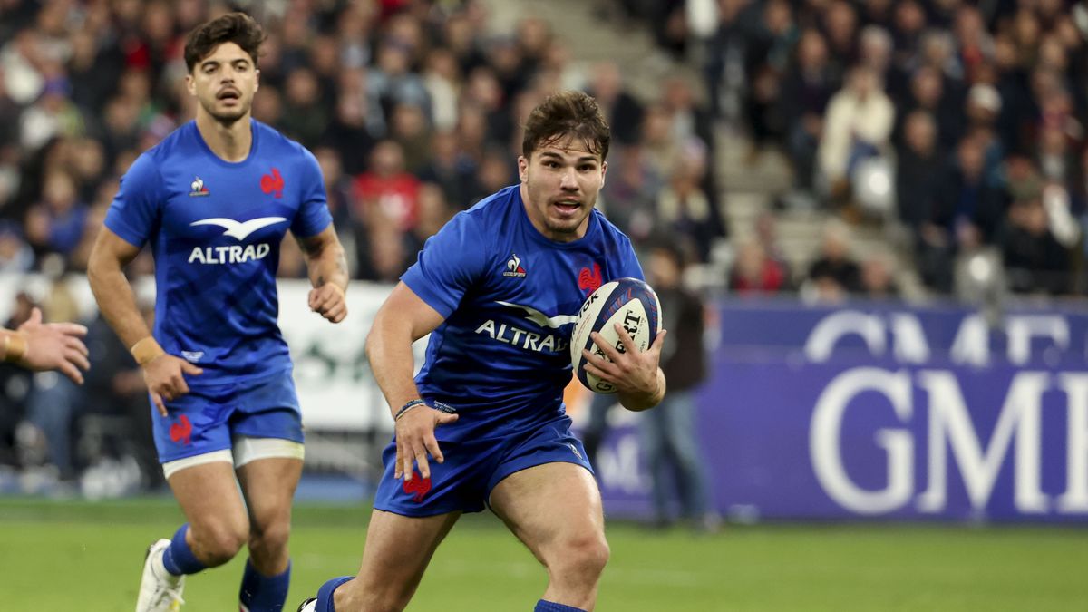 Antoine Dupont of France, wearing blue shirt, runs with the rugby ball ahead of the Autumn Nations 2024 France vs Argentina match in Week 4 