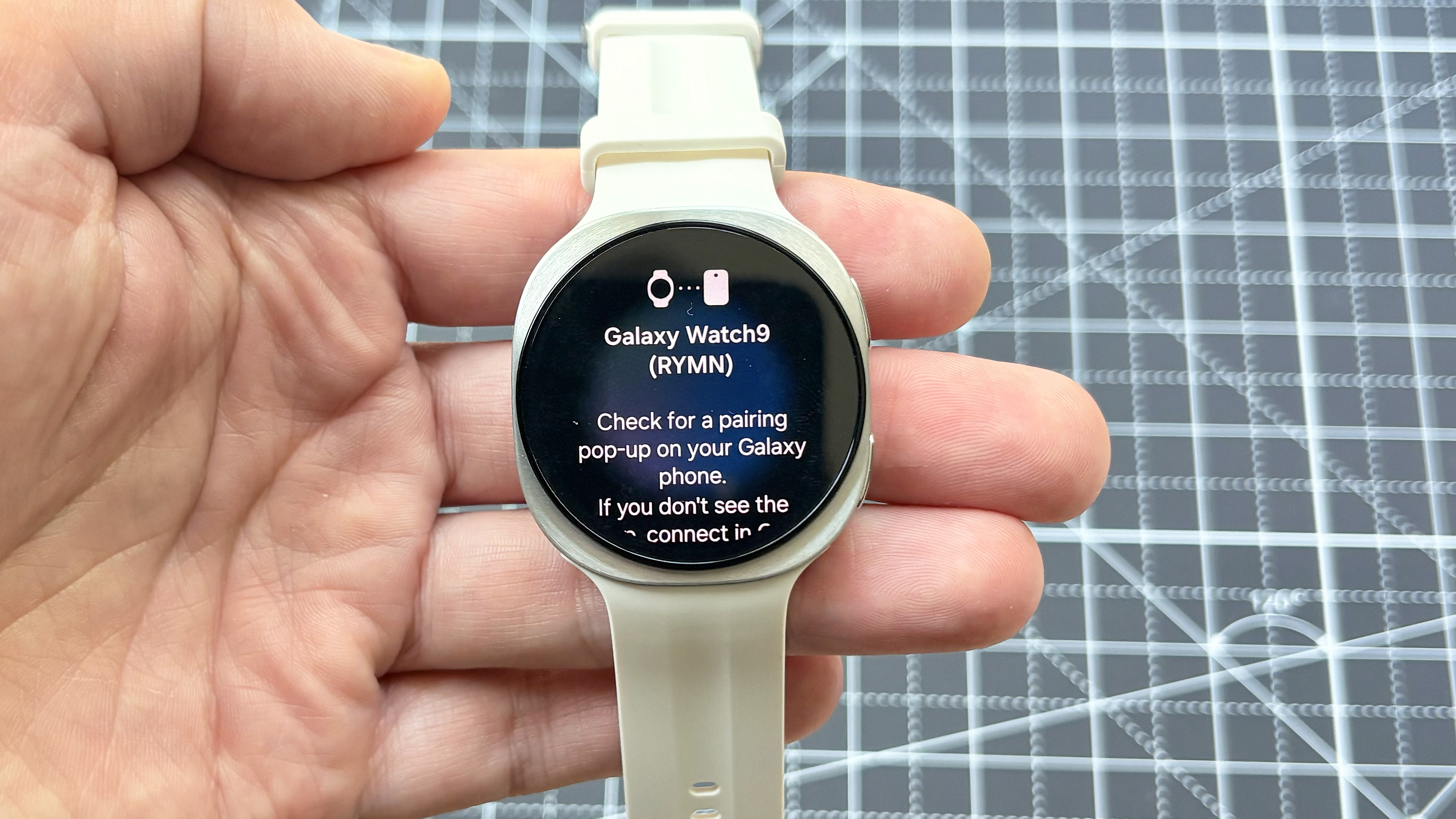 Close-up of the Samsung Galaxy Watch 9 in white