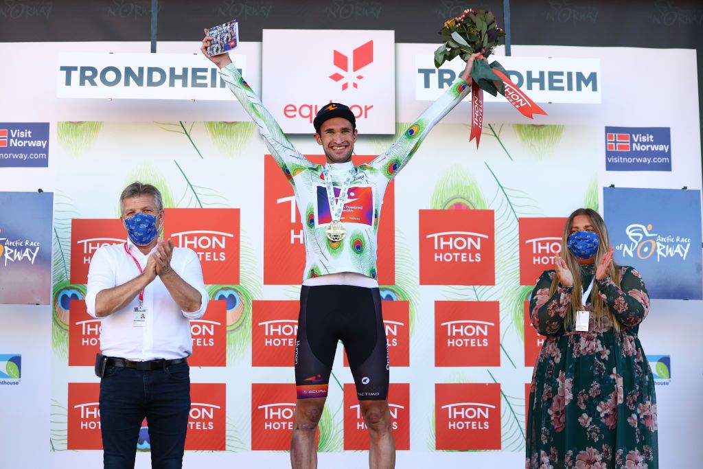 TRONDHEIM NORWAY AUGUST 14 Stephen Bassett of United States and Team Human Powered Health Polka Dot Mountain Jersey celebrates at podium during the 9th Arctic Race Of Norway 2022 Stage 4 a 1591km stage from Trondheim to Trondheim ArcticRace on August 14 2022 in Trondheim Norway Photo by Michael SteeleGetty Images
