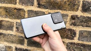 The Xiaomi 13 Pro from the back, held horizontally