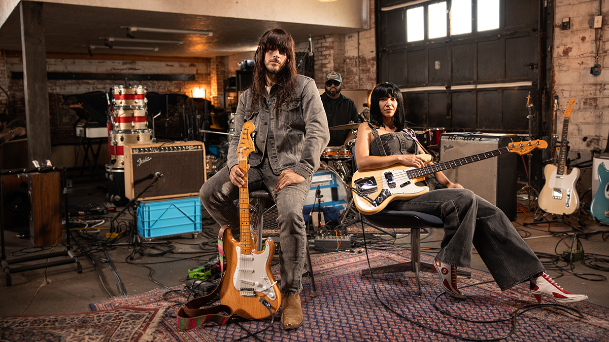 Khruangbin with their signature Fender guitar and bass