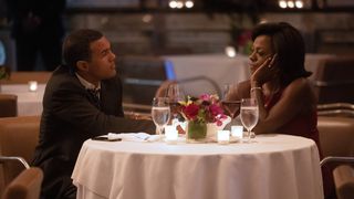 OT Fagbenle as Barack Obama and Viola Davis as Michelle Obama sit across at a dinner table in The First Lady