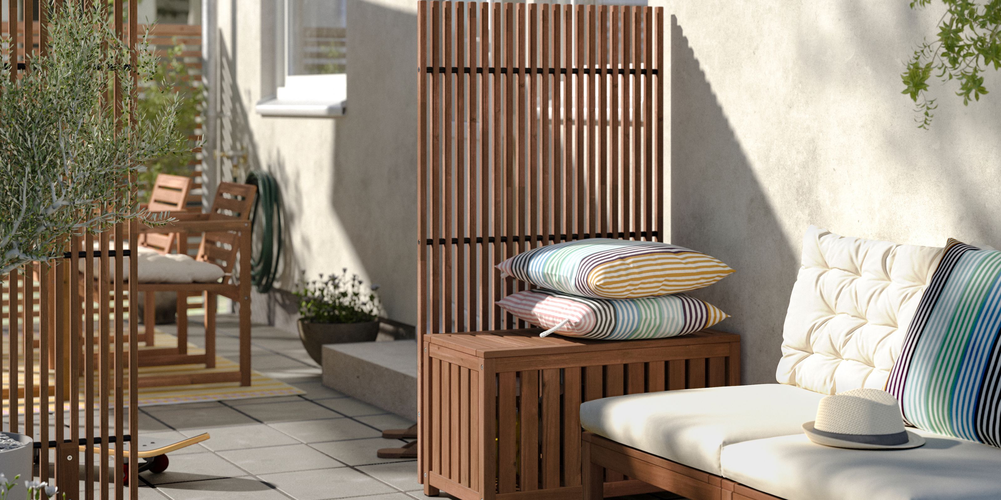 A dark wood storage box with a slatted screen behind it