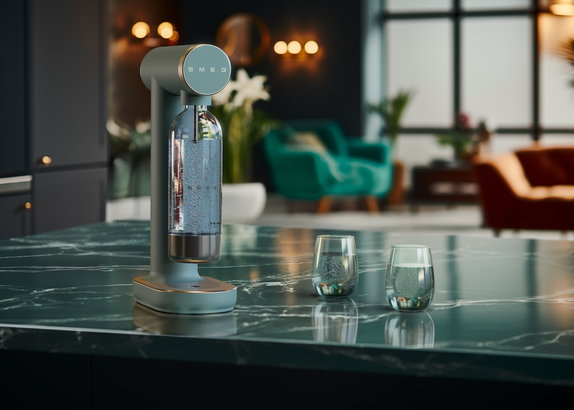 emerald green smeg soda maker on a kitchen island with two glasses placed on top