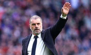 Tottenham manager Ange Postecoglou acknowledges the Spurs fans at the end of the Premier League game against Luton in March 2024.