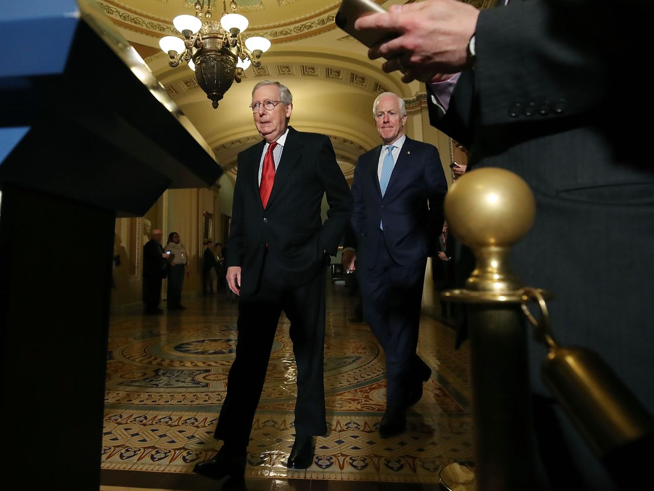 Mitch McConnell speaks to reporters about the tax bill