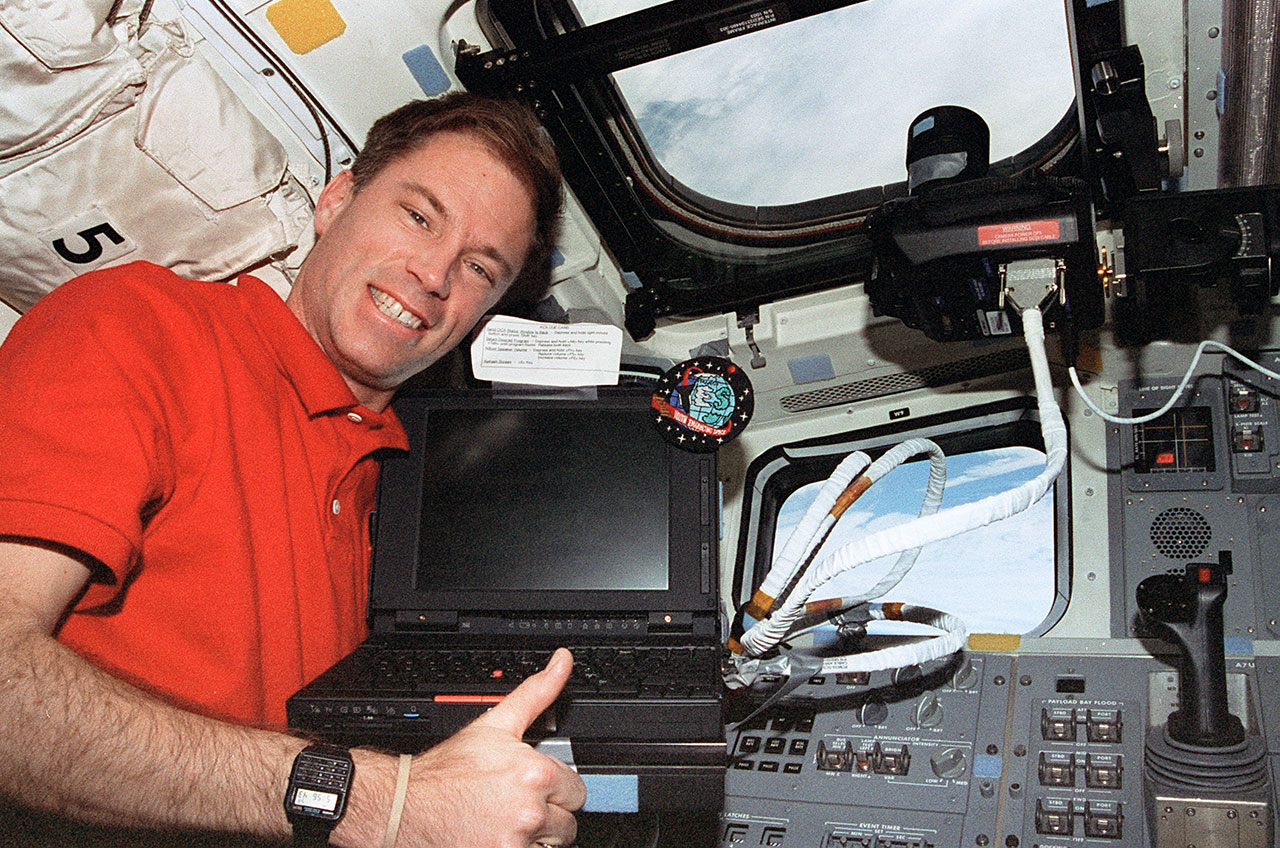 NASA astronaut Rick Searfoss, seen here as STS-76 pilot in 1996, is seen on the aft flight deck of space shuttle Atlantis