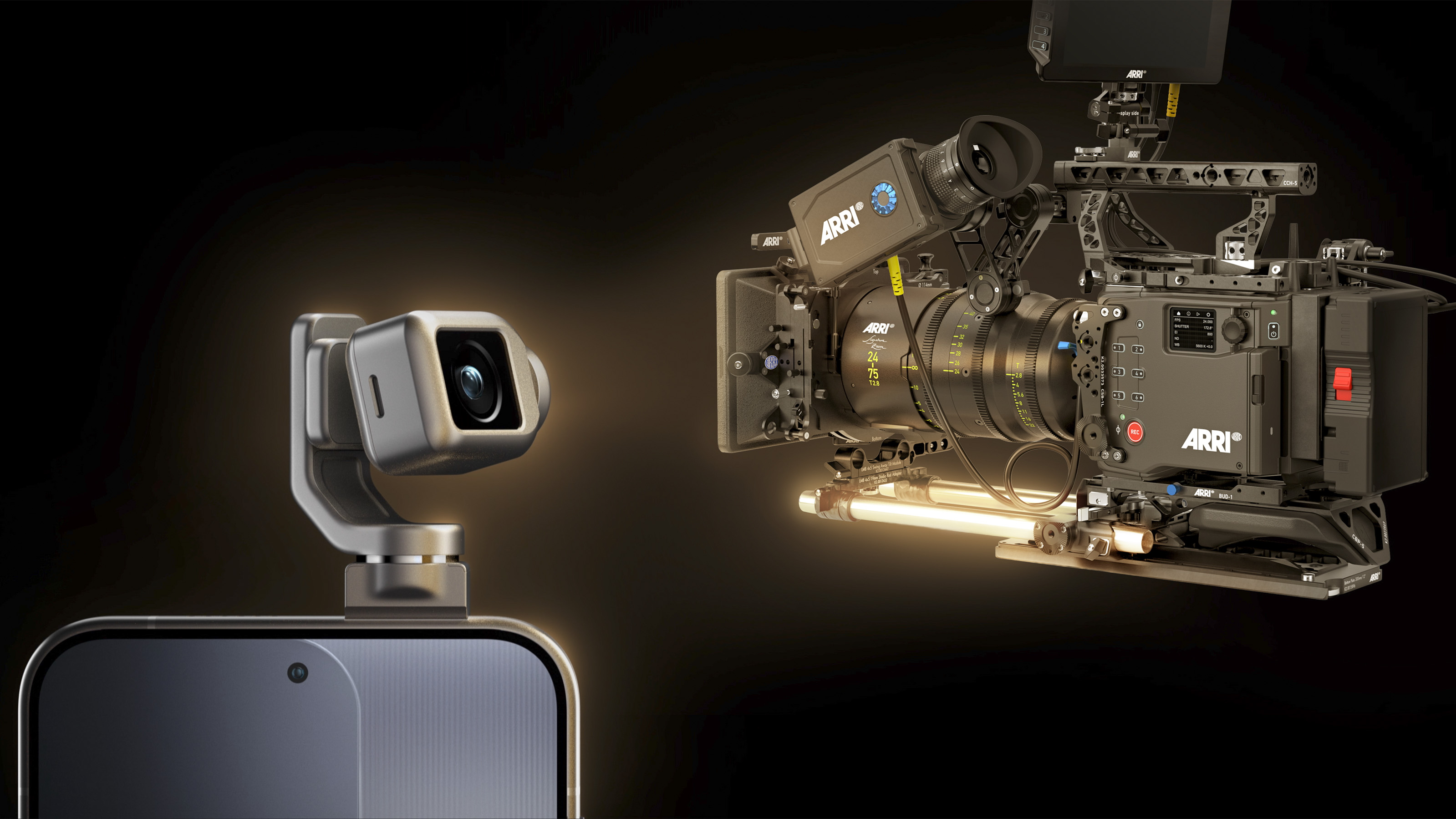 A cinema camera next to a smartphone which has a camera attached to it via a mechanical gimbal.