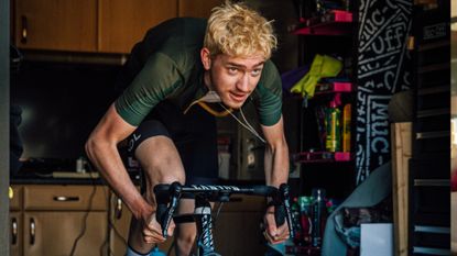 Man cycling on indoor trainer
