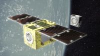 a cube-shaped spacecraft with two wing-like solar panels above earth