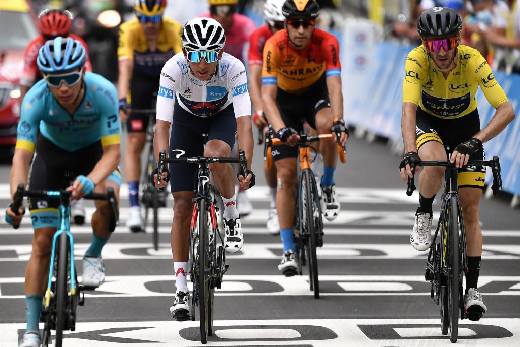 Team Ineos rider Colombias Egan Bernal 2ndL and Team Mitchelton rider Great Britains Adam Yates 1stR cross the finish line at the end of the 8th stage of the 107th edition of the Tour de France cycling race 140 km between CazeressurGaronne and Loudenvielle on September 5 2020 Photo by Marco Bertorello POOL AFP Photo by MARCO BERTORELLOPOOLAFP via Getty Images