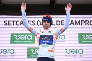 VALLTER 2000 SETCASES VALL DE CAMPOPRODON SPAIN MARCH 19 Lenny Martinez of France and Team GroupamaFDJ celebrates at podium as Orange Best Young Rider Jersey winner during the 103rd Volta Ciclista a Catalunya 2024 Stage 2 a 1865km stage from Mataro to Vallter 2000 Setcases Vall de Campoprodon 2146m UCIWT on March 19 2024 in Setcases Vall de Campoprodon Spain Photo by David RamosGetty Images