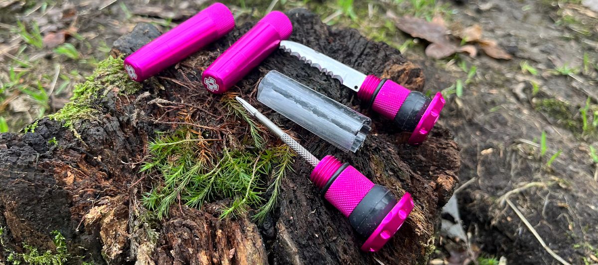 Muc-Off Stealth Tubeless Puncture Plug parts on a log