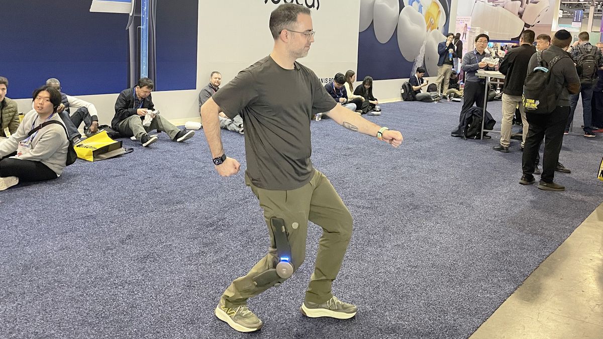 Tom&#039;s Guide writer Dan Bracaglia demoing the MO/GO power pants at CES 2025