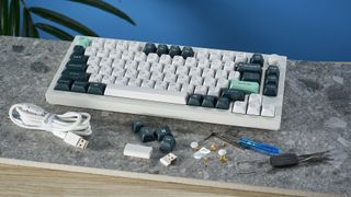 The Keychron Q1 HE magnetic keyboard in white and green