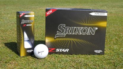 Z Star golf ball and box pictured outdoors