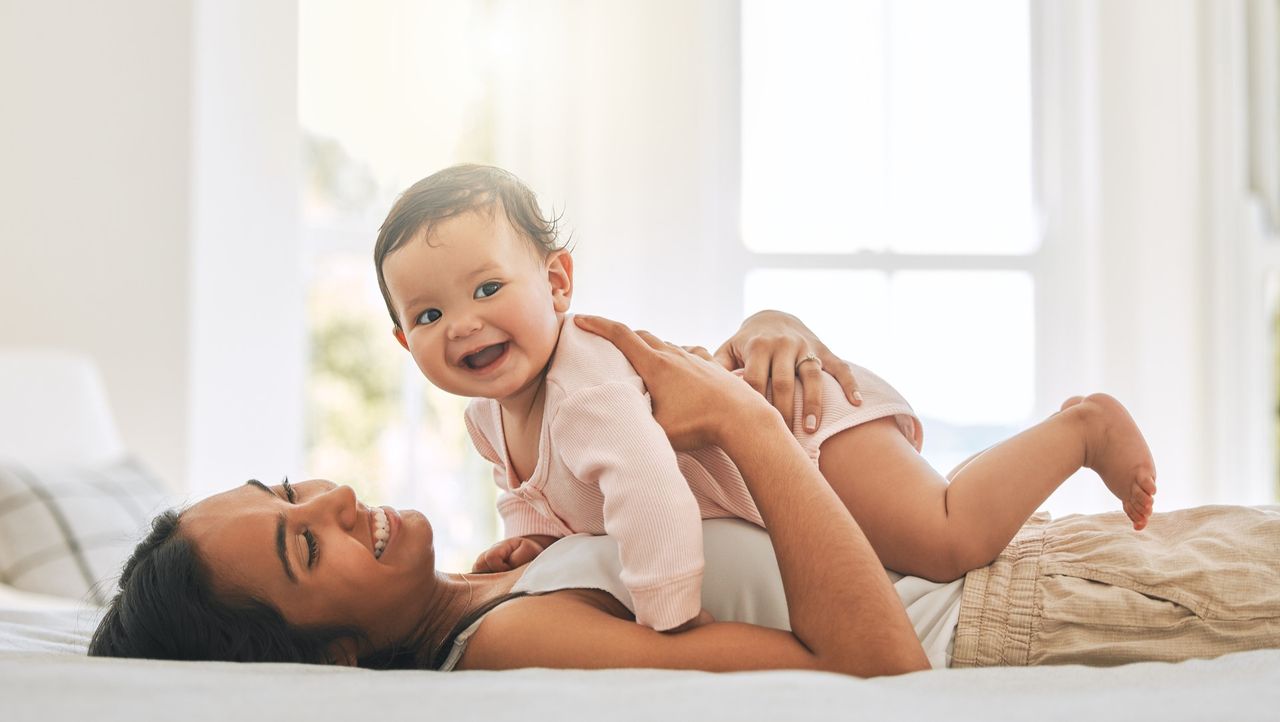 Mum and baby playing