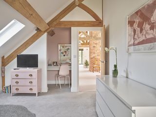 oak framed bedroom with view to landing