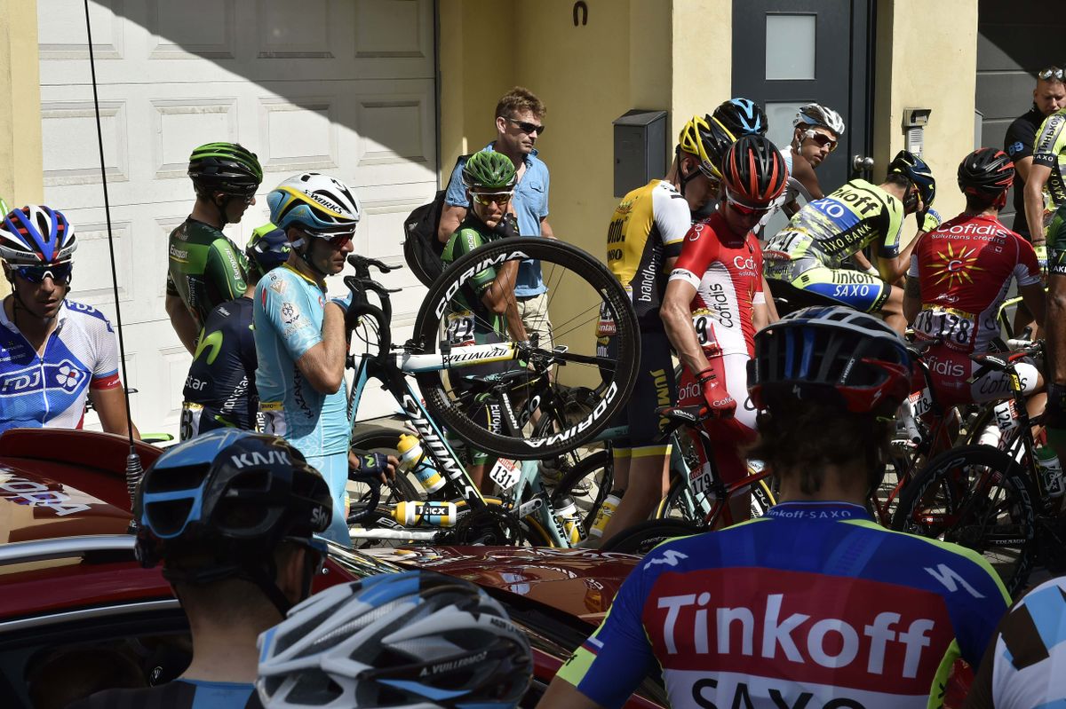 Vincenzo Nibali (Astana) waits with his bike for the stage to restart