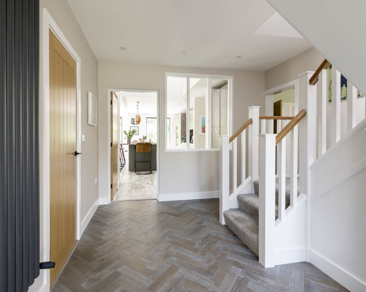 The internal layout was reconfigured to create a spacious landing with a balcony overlooking the two-storey glazed atrium.