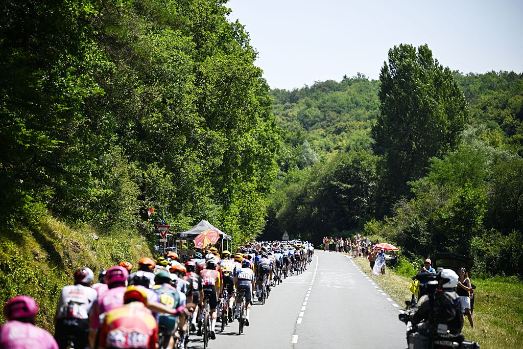 The pack of riders pictured in action during the stage 8 of the 2026 Tour de France cycling race, a stage of 182km from Perigueux to Bergerac, on Saturday 11 July 2026. The 113th edition of the Tour de France starts on Saturday 4 July in Barcelona, Spain, and will finish in Paris, France on the 26th of July. BELGA PHOTO TOMAS SISK POOL (Photo by TOMAS SISK POOL / BELGA MAG / Belga via AFP)