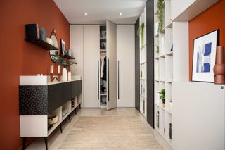 a hallway with Schmidt Kitchens wonder wall