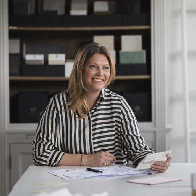 Portia Fox interior design studio founder at table